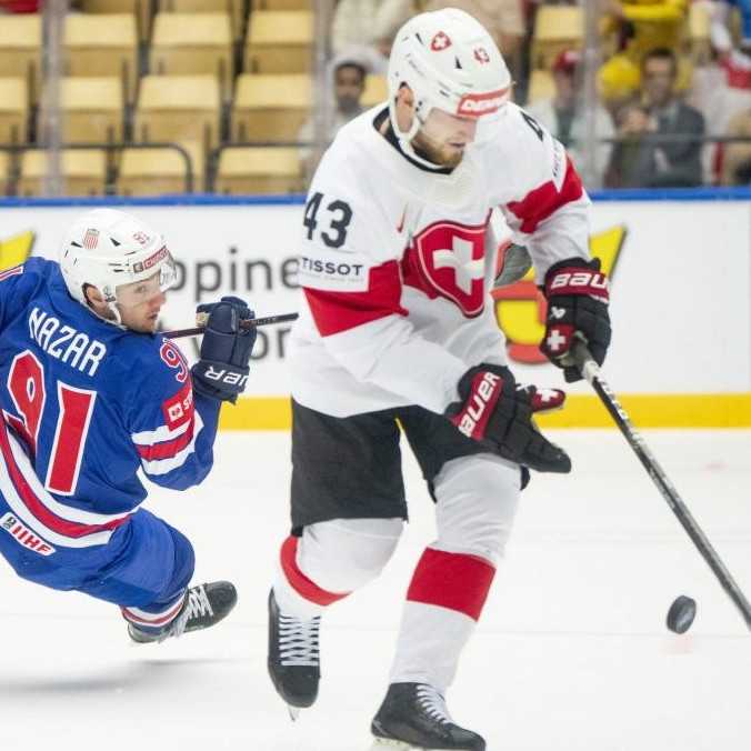 Švajčiari pripravili Američanom prvú prehru na šampionáte, brankár Genoni s čistým kontom