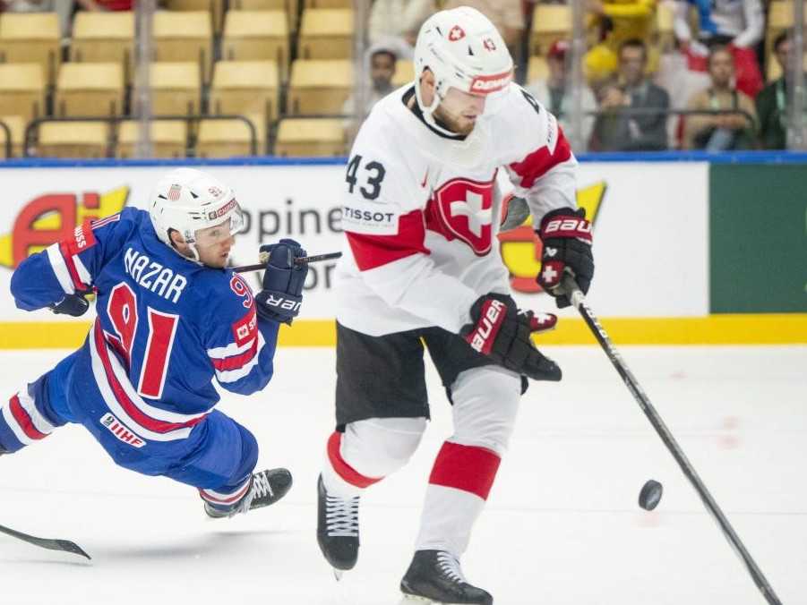 Švajčiari pripravili Američanom prvú prehru na šampionáte, brankár Genoni s čistým kontom