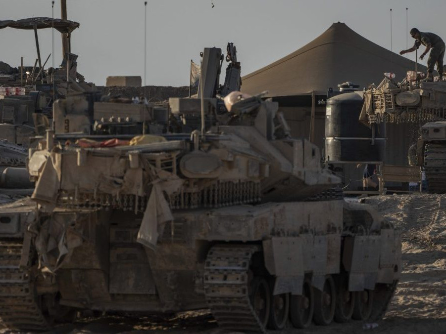 Izraelskí vojaci na hranici mesta Gaza.