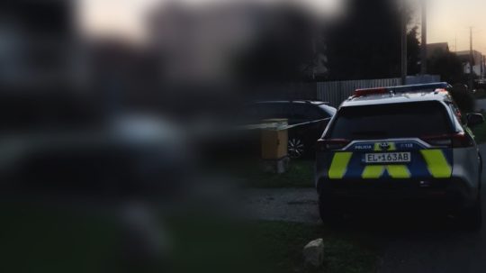 Na snímke policajné auto.