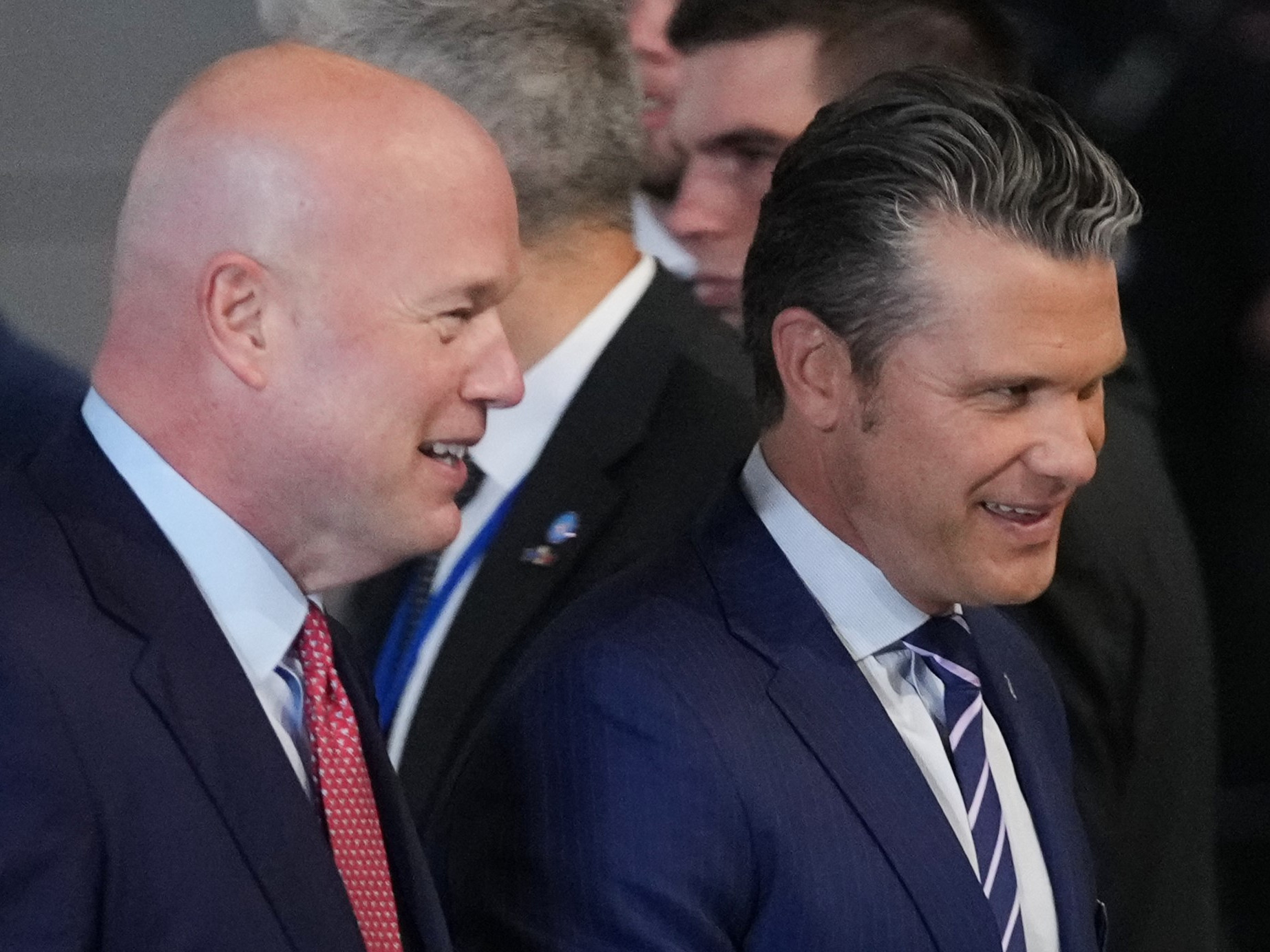 M. Whitaker a P. Hegseth