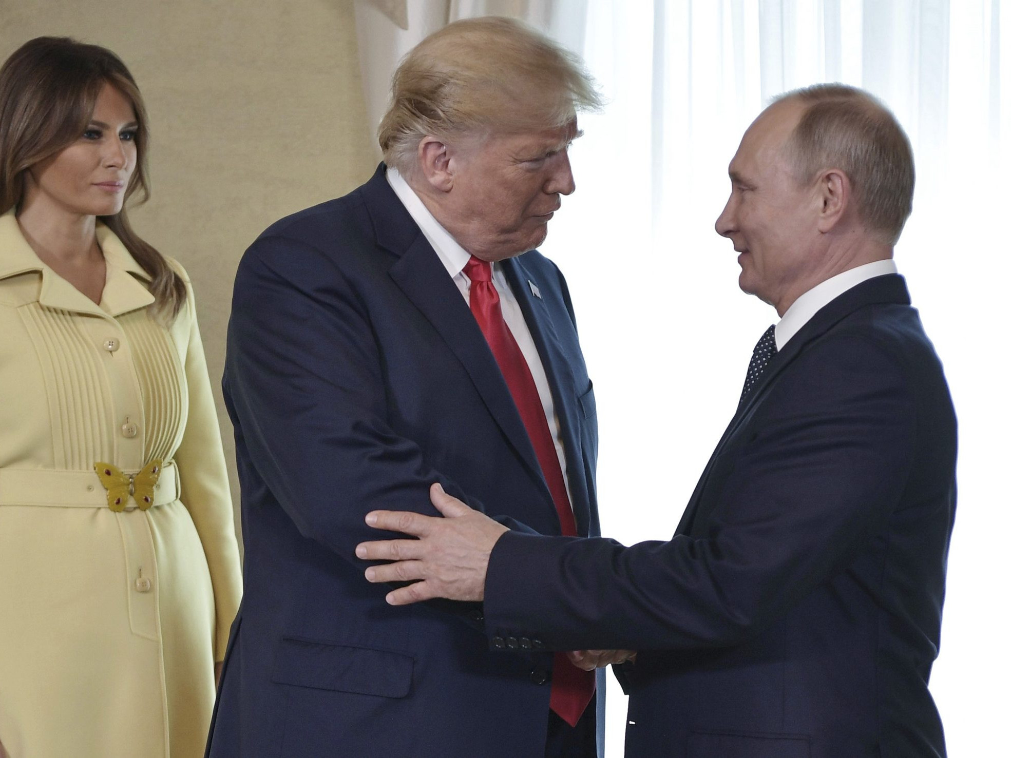 Archívna fotografia Melanie, Donalda Trumpa a Vladimira Putina.