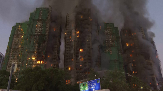 Požiar bytoviek v Hong Kongu.