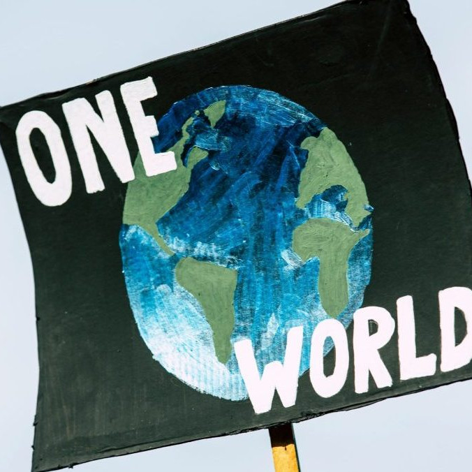 Plagát s nápisom "Jedna Zem".